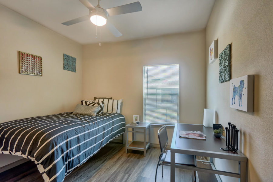 bedroom at forum at denton station student apartments